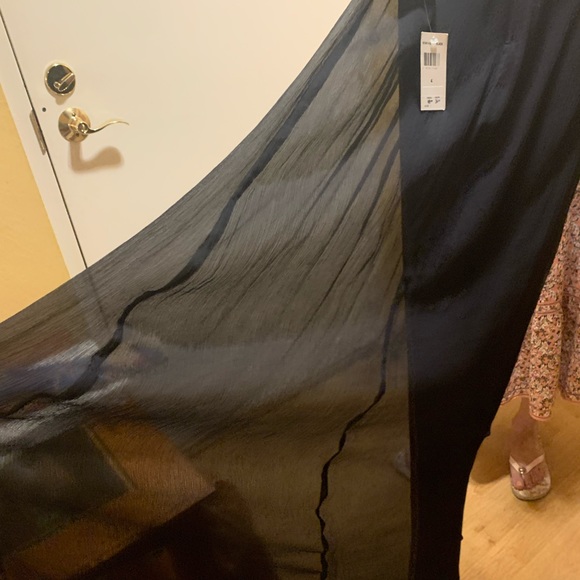 Black gown, long sleeve, stretch sheer sleeves, and rhinestone collar. - Picture 6 of 7